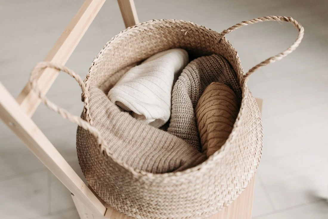 Folded knitwear in a basket