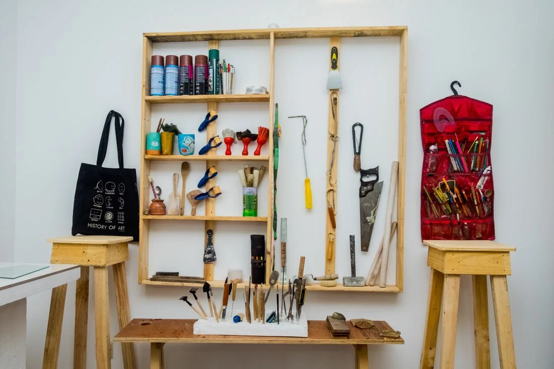 Hand tools arranged in a workshop