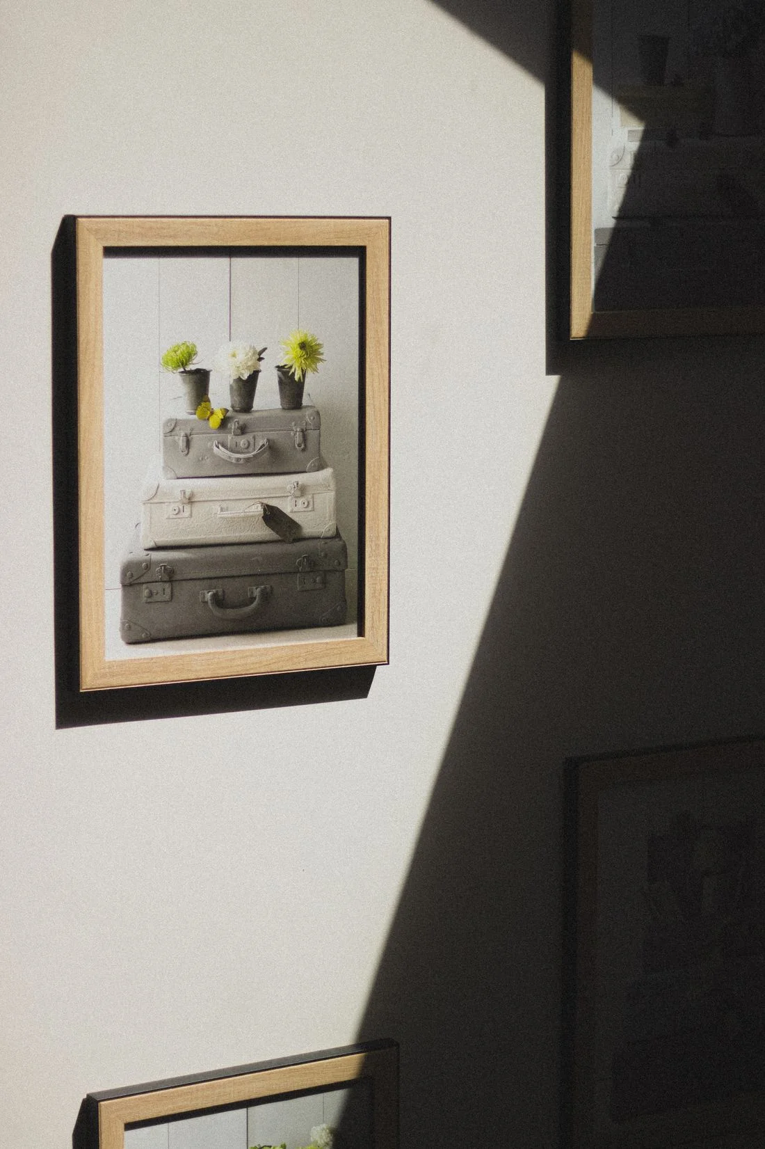 Framed wall art with strong light and shadow