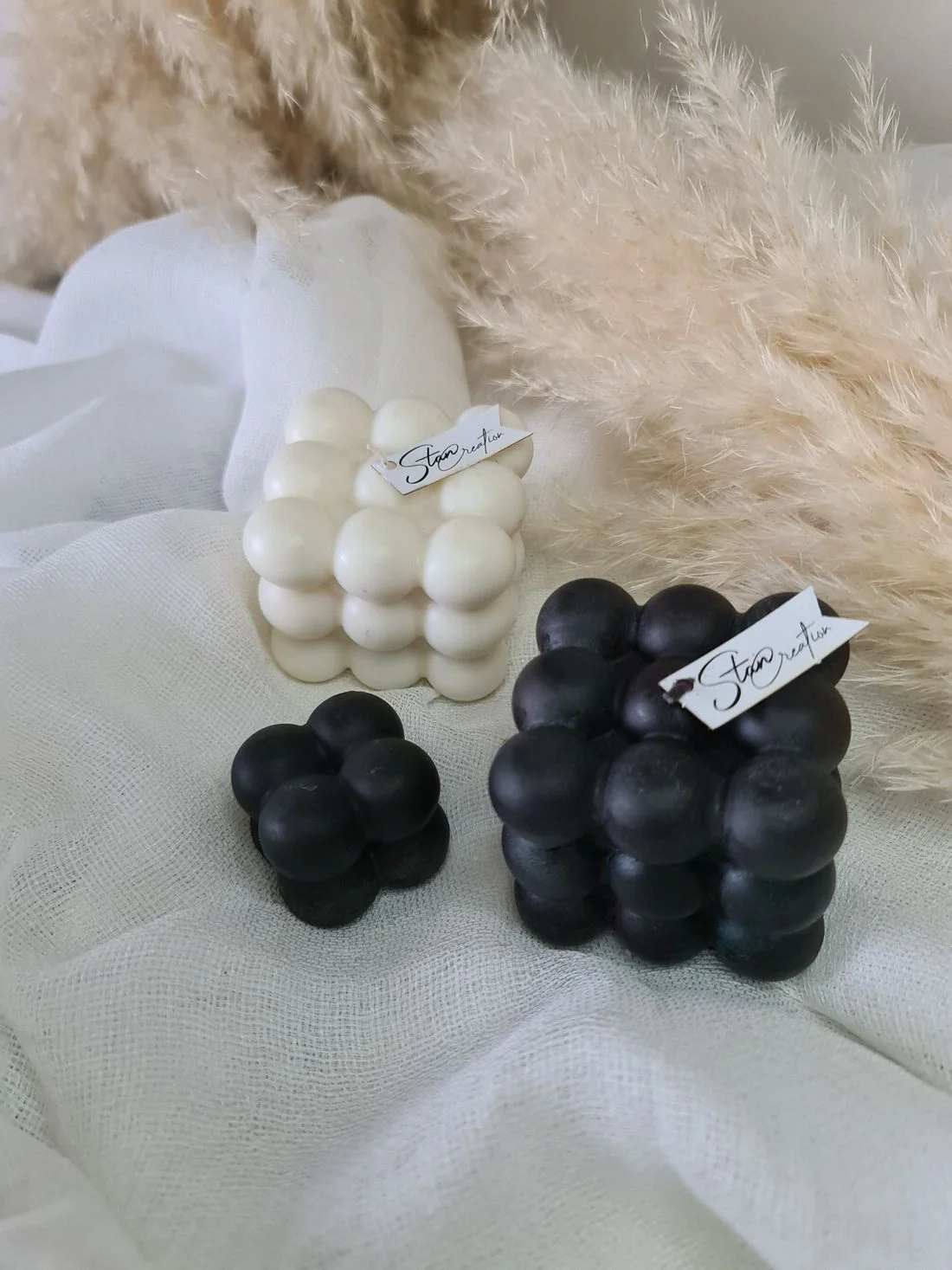Sculptural black and white candles