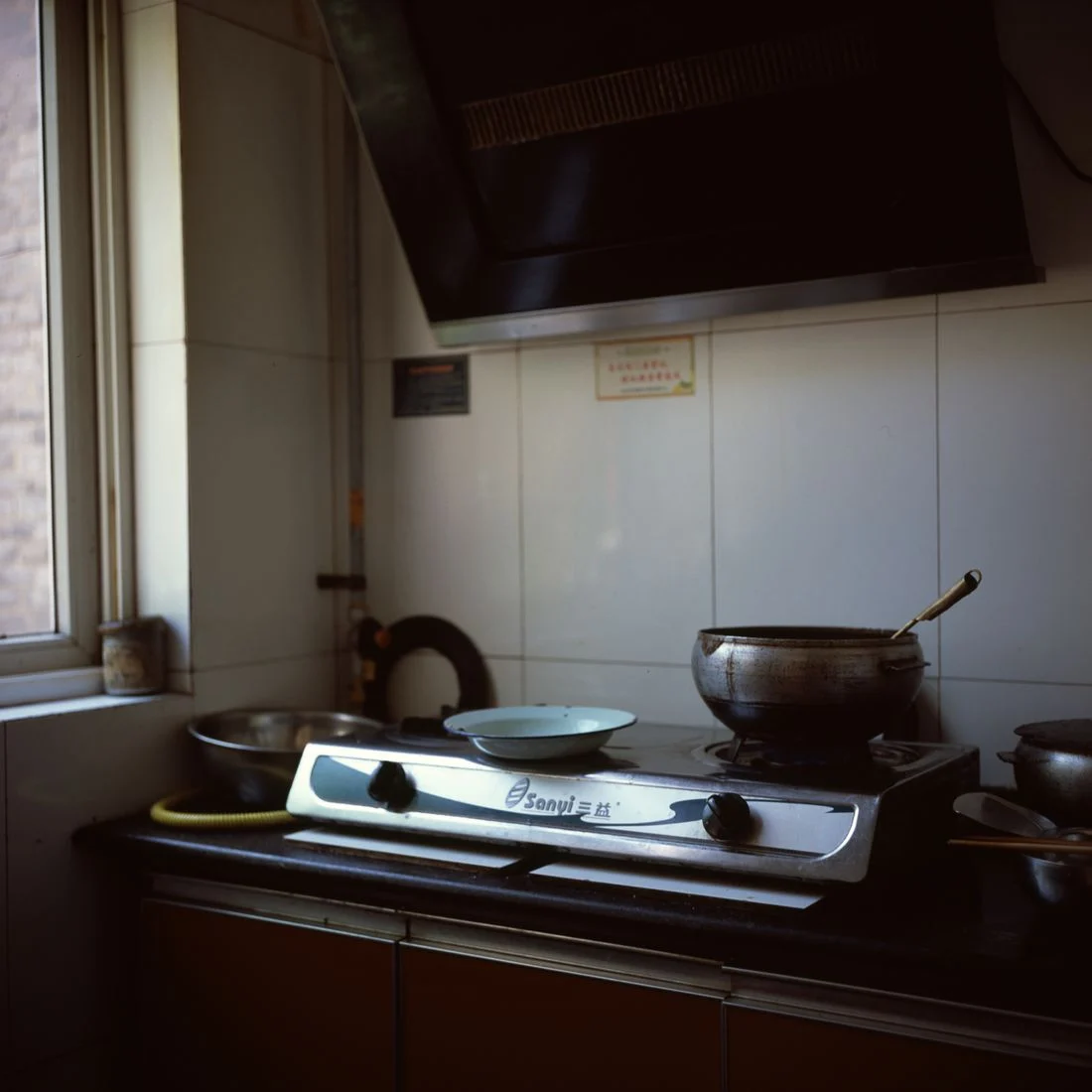 Pots and pans in a small kitchen